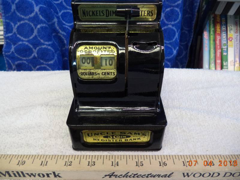 lot 1600 image: Uncle Sams 3 Coin Register Bank