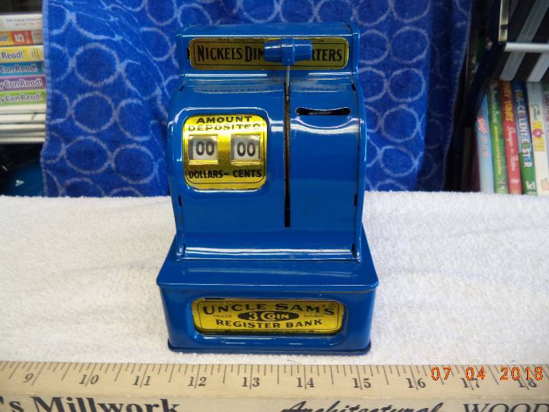 lot 1601 image: Uncle Sams 3 Coin Register Bank- Blue