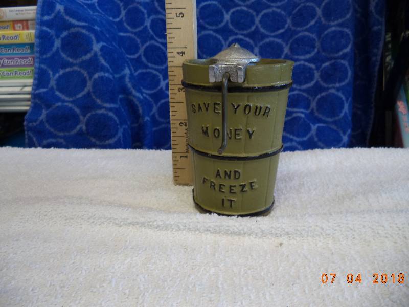 lot 1602 image: Cast Bank- Ice Cream Maker- Save Your Money and Freeze It