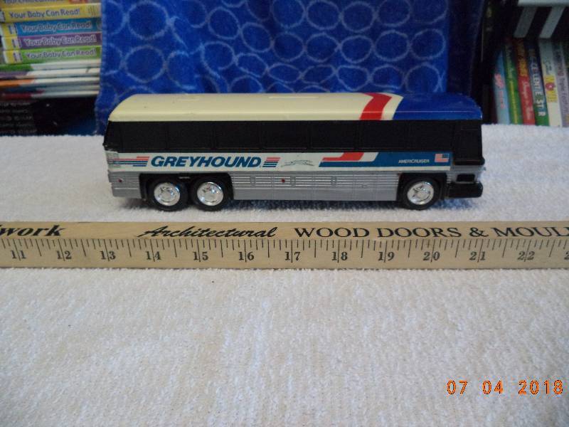 lot 1604 image: Greyhound Bus Bank- 8 inches