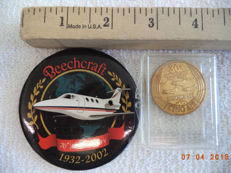 lot 1685 image: 30th Anniversary Beechcraft Aircraft Medallion and Pin