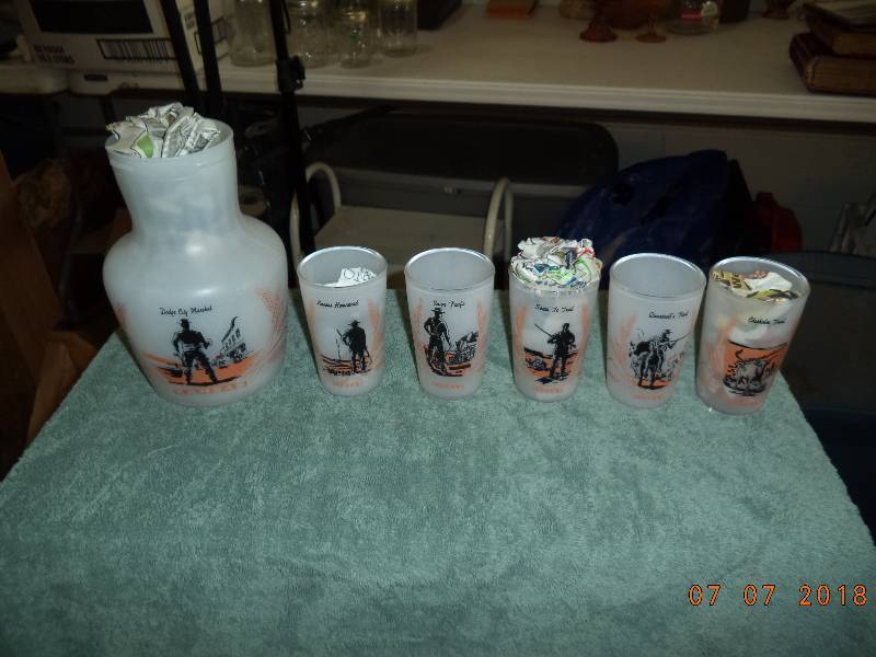 lot 1810 image: Vintage Dodge City Western Themed Glasses and Pitcher