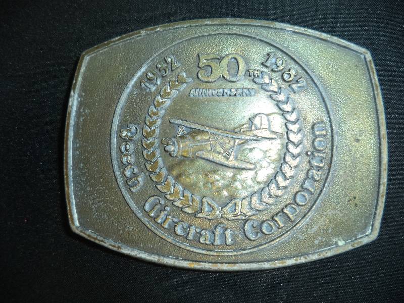 lot 1901 image: Beech Aircraft 50th anniversary belt buckle