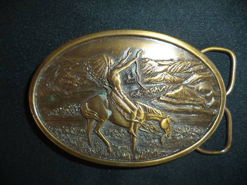 lot 1907 image: 1977  Brass Belt Buckle- Indian Chief On Horse