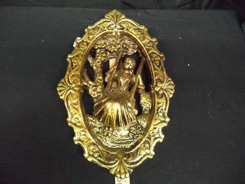 lot 2025 image: Wall Decor  Woman on Swing