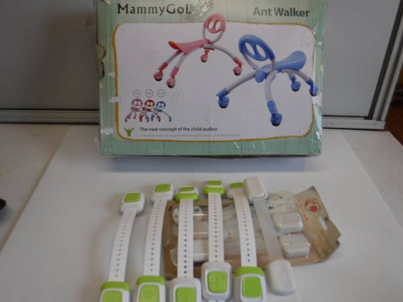 lot 1052 image: baby walker and childproof cabinet locks
