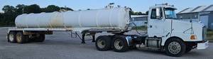 lot 31 image: 2011 Dragon 130 BBL Vacuum Trailer - 42ft - New Landing Gear - Air Ride - Air Brakes - Walkway - Toolbox - Work Lights - Very Good Rubber - Vin 1UNST4222BL081797
