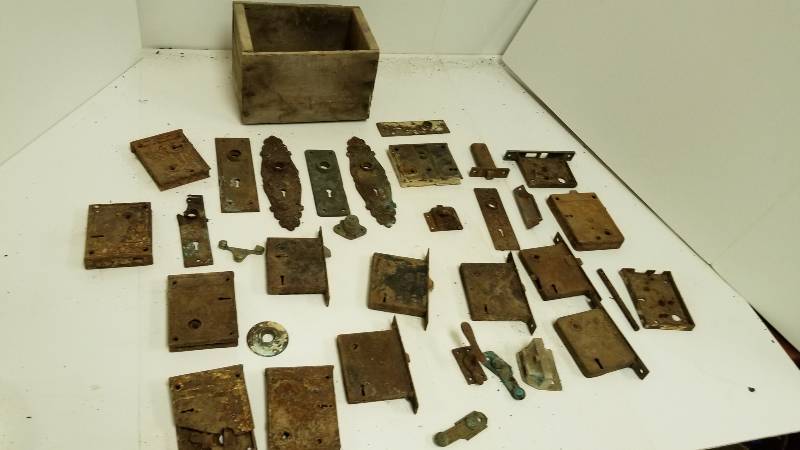 lot 1298 image: Antique Door Latches  Locks  Hardware and wood box