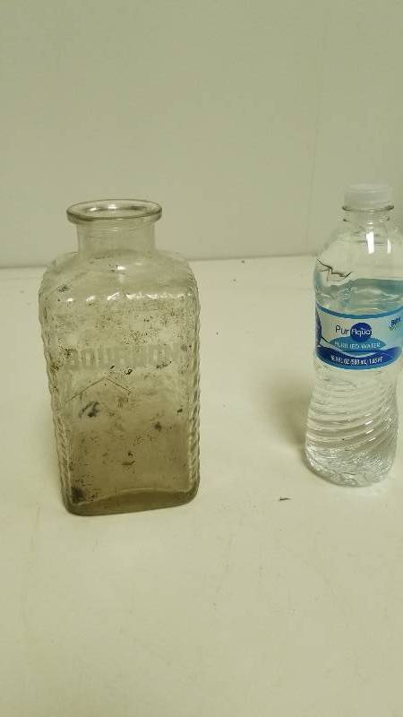 lot 1306 image: Old Bourbon Glass Bottle - Dug out of creek years ago