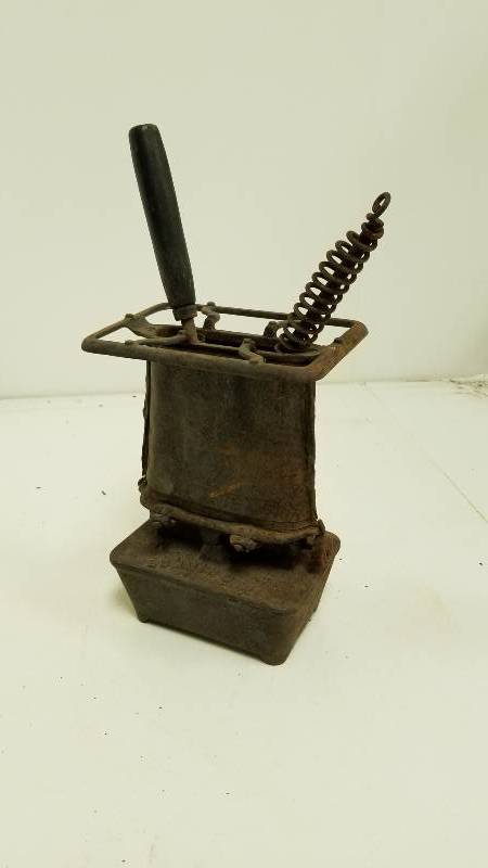 lot 1314 image: Antique Hair Care - Put on your old stove and heat up