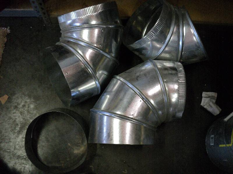 lot 1042 image: (4) metal HVAC fittings