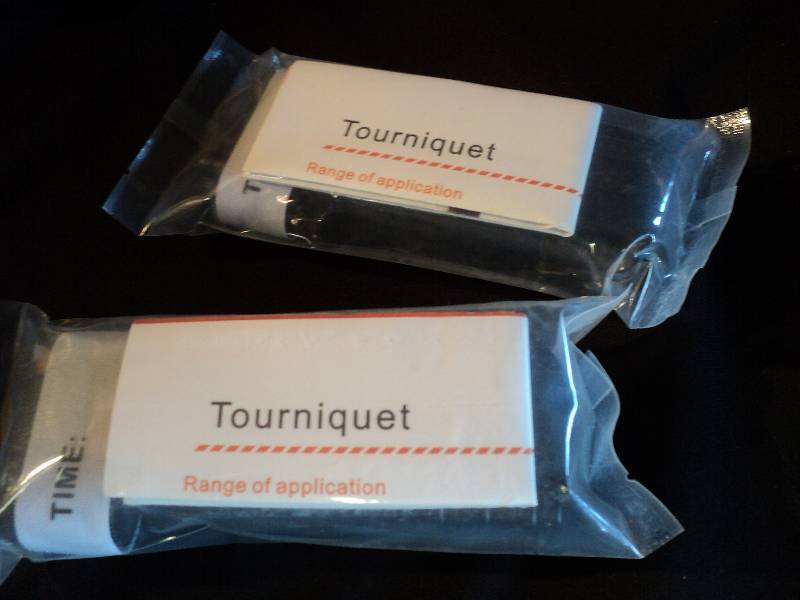lot 1146 image: (2) CT lot military style tourniquet