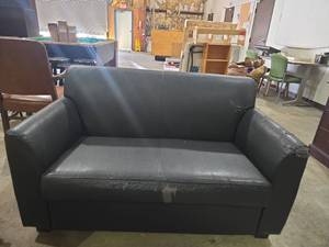 lot 6956 image: Black Faux Leather Loveseat