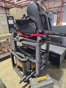 lot 6984 image: Next Level Racing Bundle With Thrustmaster TH8A Shifter and Racing Clamp, and  Gaming Chair