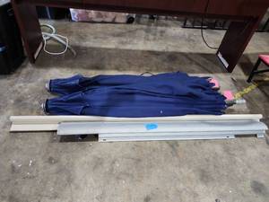 lot 47253 image: (2) Navy Blue Outdoor Umbrellas