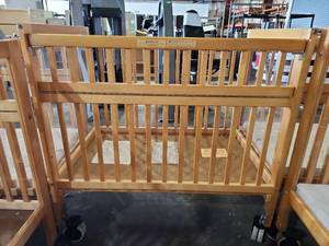 lot 47452 image: Evacuation Crib With Large Locking Wheels - No Mattress