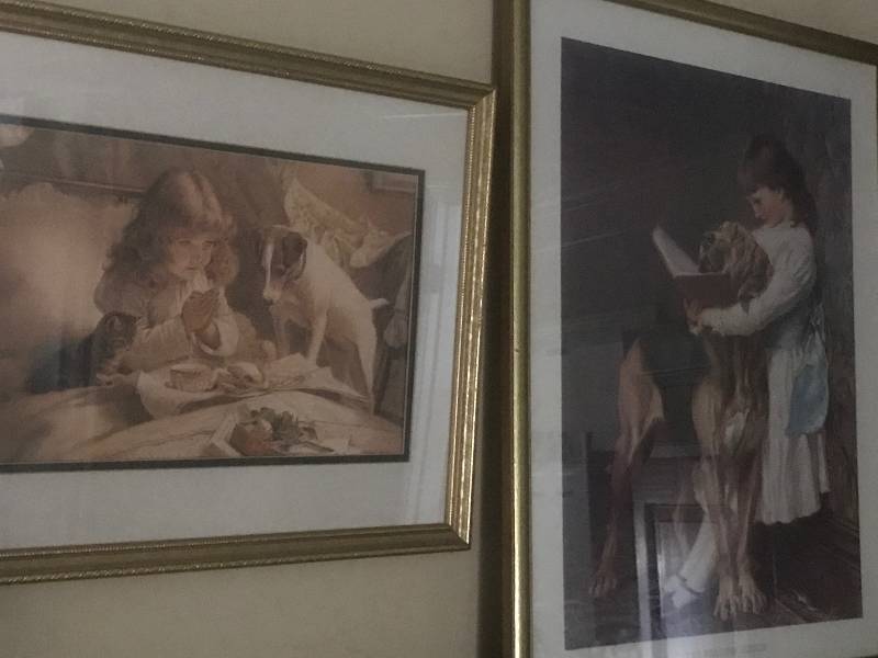 lot 163 image: Antique Framed Wall Art--Girl praying with her dog & Girl reading book to her dog