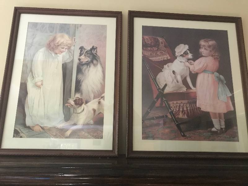 lot 164 image: Antique Framed Wall Art--Girl at bedtime with dogs & Girl dressing up her dog