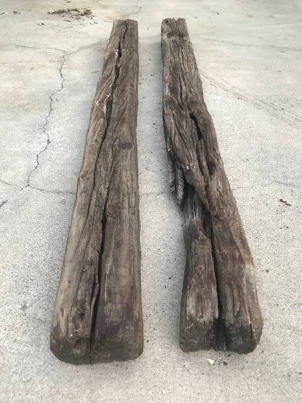 lot 260 image: Two rusticweathered railroad timbers. Length 95�