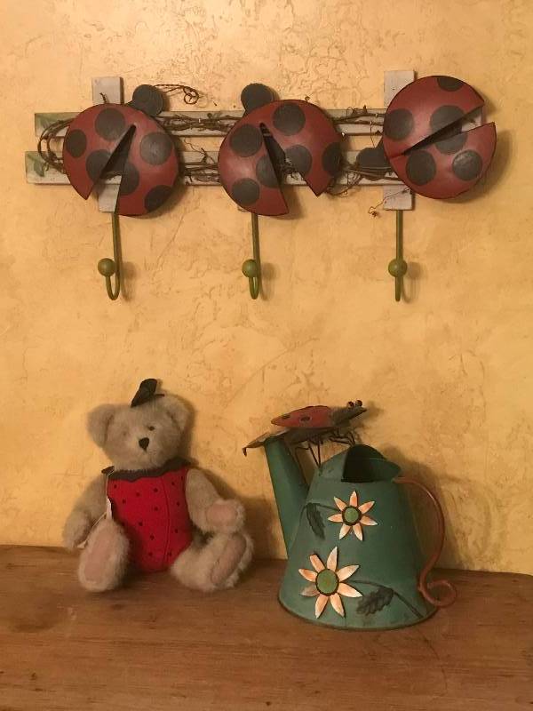 lot 261 image: Lady Bug time---wall rack, teddy and rustic watering can