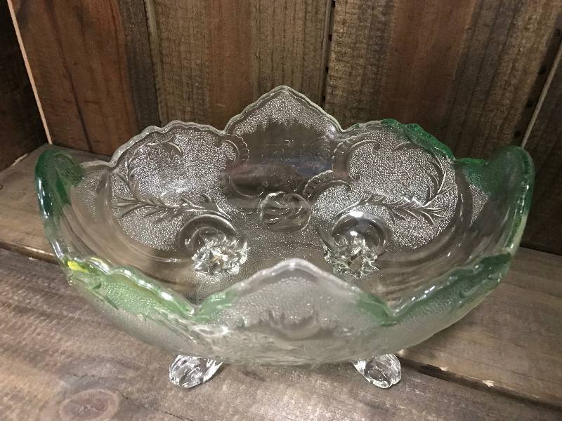 lot 297 image: Claw footed glass bowl with a green tint