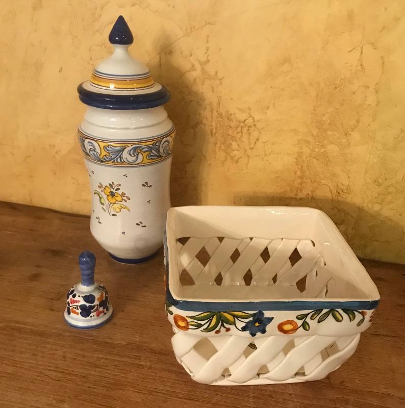 lot 1050 image: Blue and Yellow painted ceramic (bell, vase with lid, basket)
