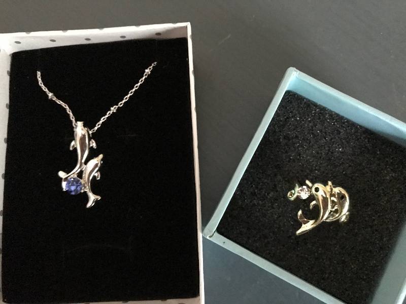 lot 1054 image: Dolphin Jewelry (ring and necklace)