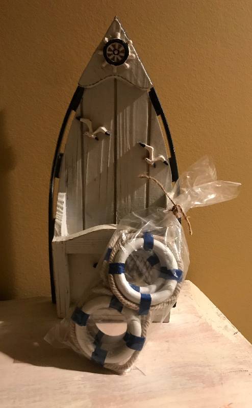 lot 1057 image: Boat Letter holder and napkin rings