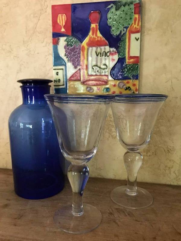 lot 1063 image: Blue Glass Decanter, wine glasses and ceramic wall tile