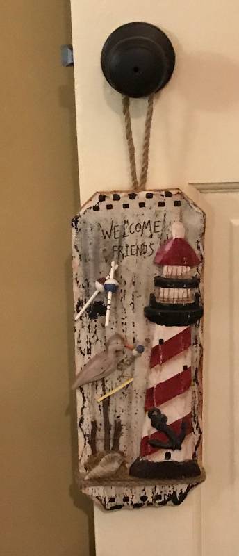lot 1089 image: Welcome friends lighthouse hanging sign
