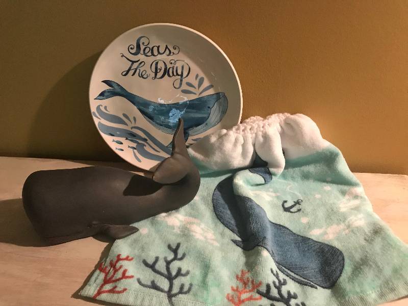lot 1094 image: Humpback Seas the Day---plate, towel and whale statue