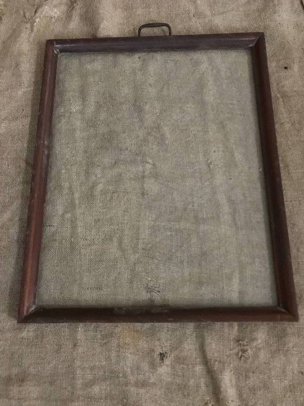 lot 30 image: Framed glass tray from a vintage serving cart, only has one handle--great architectural salvage piece