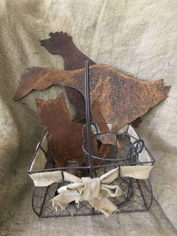 lot 31 image: Metal egg baskets and rustic tin animal cut outs (duck, chicken, cat)