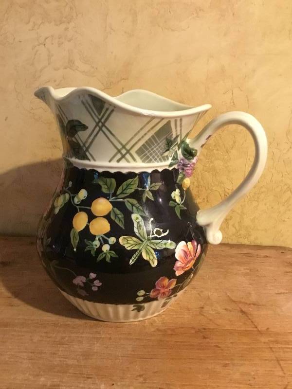 lot 41 image: Decorative Black Pitcher with Fruit design