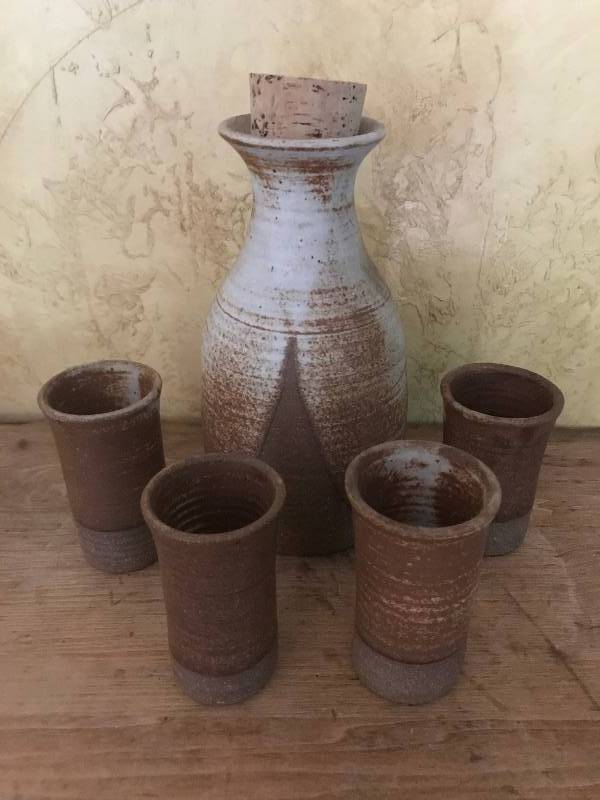 lot 51 image: Stoneware decanter with cups