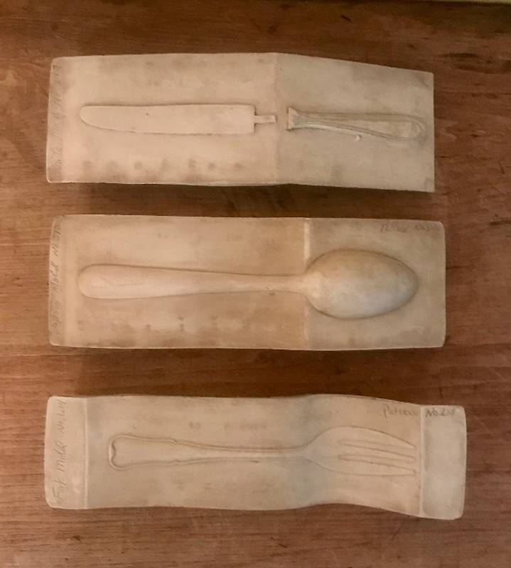 lot 56 image: Molded tiles of silverware (Wall Art)