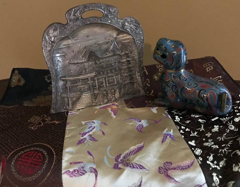 lot 67 image: Oriental Items--Vintage metal embossed crumb tray, metal dragon incense and place mat 14 x 20