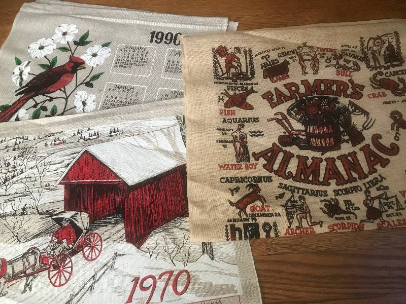 lot 141 image: 1965 Farmers Almanac Vintage Tea Calendar along with 1970 Vintage Tea Calendar (Red Covered Bridge) and 1990 Red Cardinals