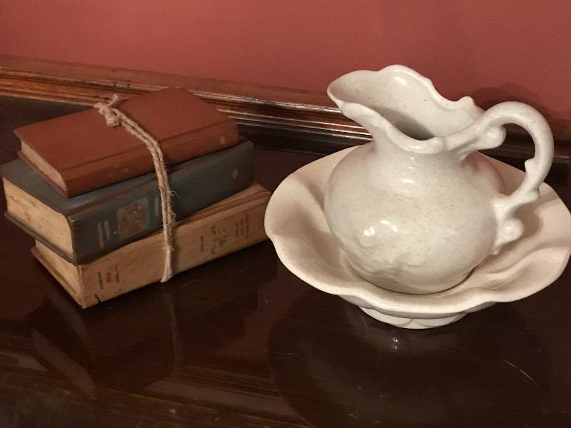 lot 108 image: Minatare pitcher and bowl along  with rustic set of wood book dcor