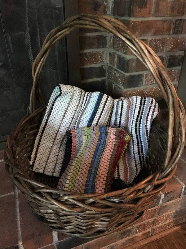 lot 111 image: Large Basket with braided rugs