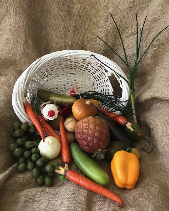 lot 126 image: Basket full of a variety of artificial vegetablesfood