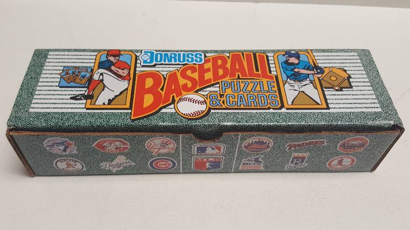 lot 1249 image: 1990 Donruss Baseball Complete 660 Card Factory Sealed Set w Rated Rookies & HOF Puzzle