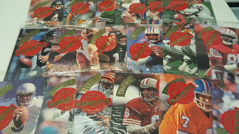 lot 1232 image: 1992 Action Packed Mammoth Jumbo 8x10 Football Cards Lot of 18 w John Elway Jerry Rice Jim Kelly