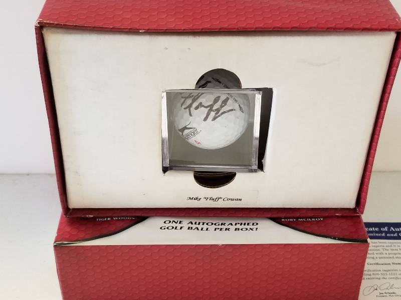 lot 1166 image: Mike Fluff Cowan Autographed PGA Golf Ball HOFer w Display Cube & COA