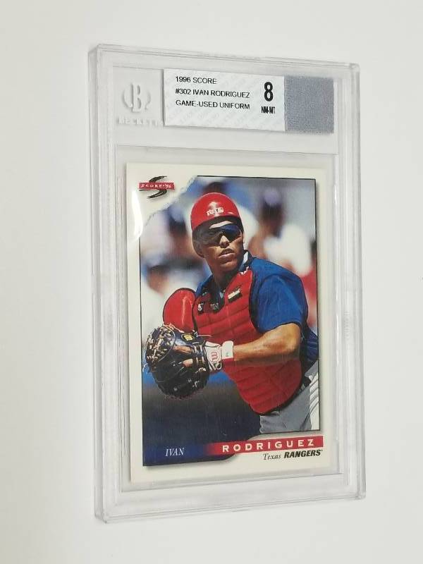 lot 1194 image: 1996 Score Ivan Rodriguez Graded Beckett BGS 8 w Game Used Jersey Swatch