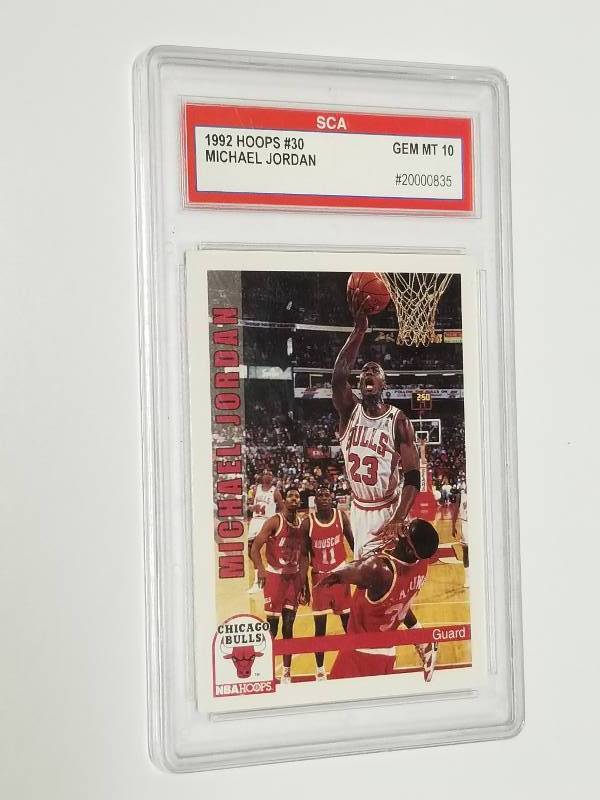 lot 1196 image: 1992 Hoops Michael Jordan #30 Graded SCA Mint Chicago Bulls HOF