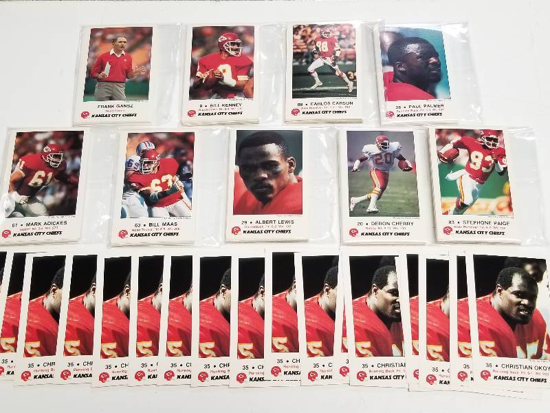 lot 1214 image: 1988 Kansas City Chiefs Police Card Complete Team Sets Lot of 20 w Christian Okoye Rookie Cards