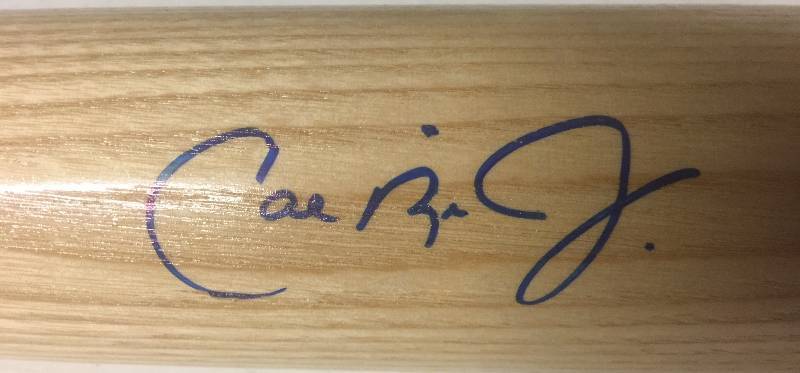 lot 1000 image: Signed Cal Ripken Jr Full Sized Rawlings Baseball Bat with Major League Baseball Certification & Hologram & Cert of Authenticity 100% Real