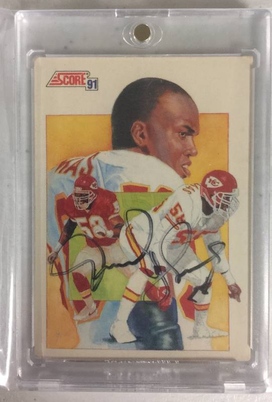lot 1064 image: Signed Derrick Thomas 1991 Score Football Card In Magnetic Acrylic Holder