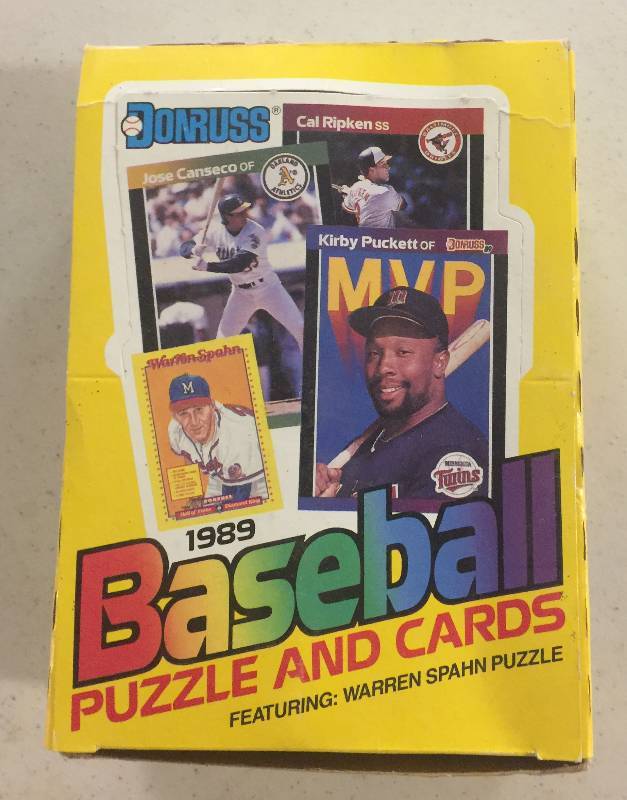 lot 1068 image: Unopened 1989 Donruss Wax Box with 36 Factory Sealed Packs in Mint Condition with Possible Rookies of Ken Griffey Jr, Craig Biggio, Randy Johnson